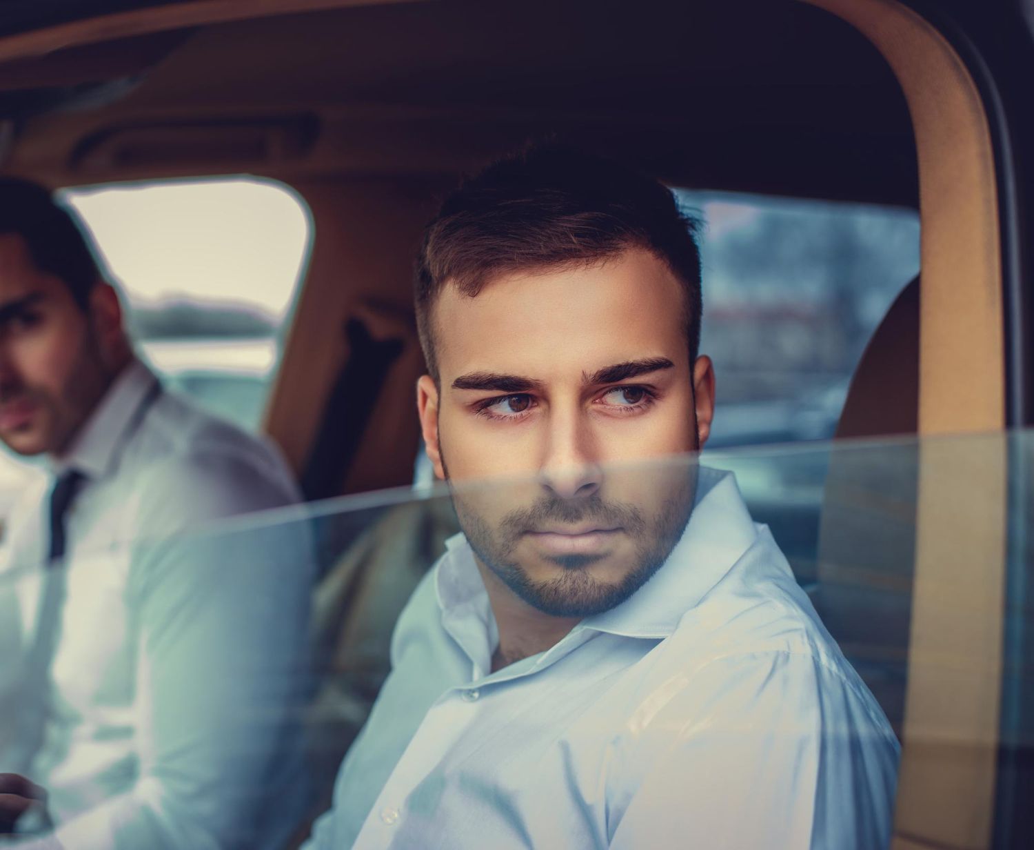 12 Freepik.com two_guys_white_shirts_car_e78eab777e.jpg