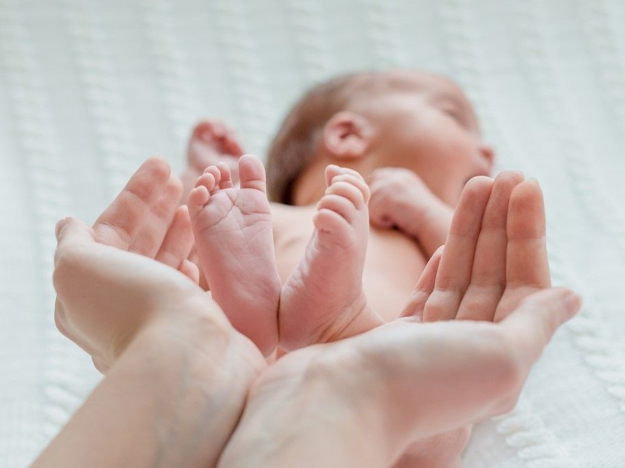 baby-feet-mother-hands_1024x683.jpg