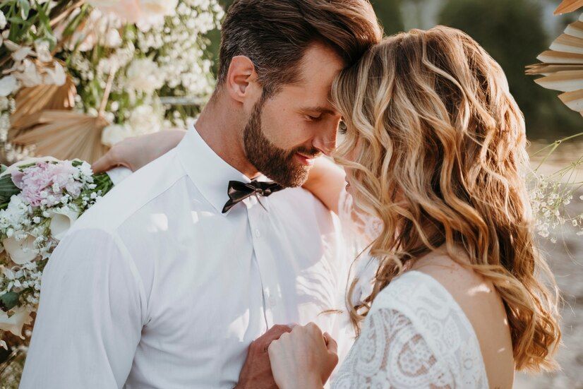 bride-groom-having-their-wedding-beach_23-2149043967.jpeg