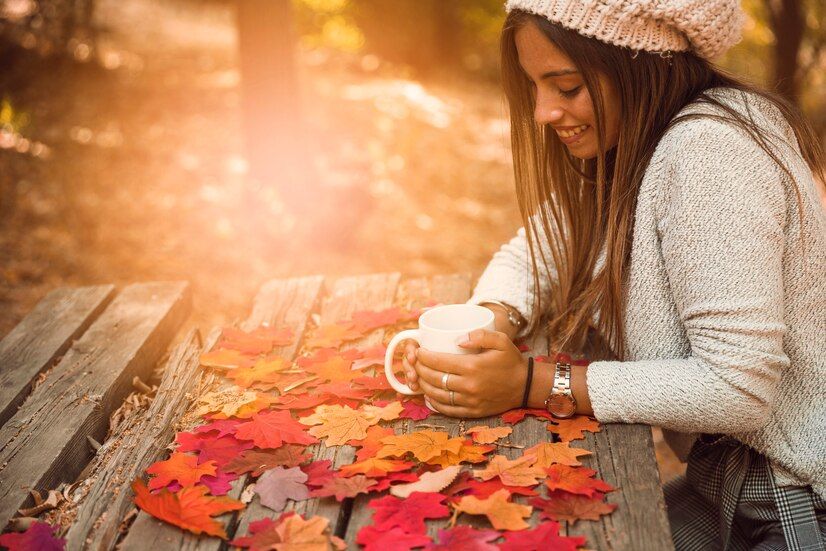 cheerful-woman-with-mug-table-autumn-part_23-2147883223.jpg