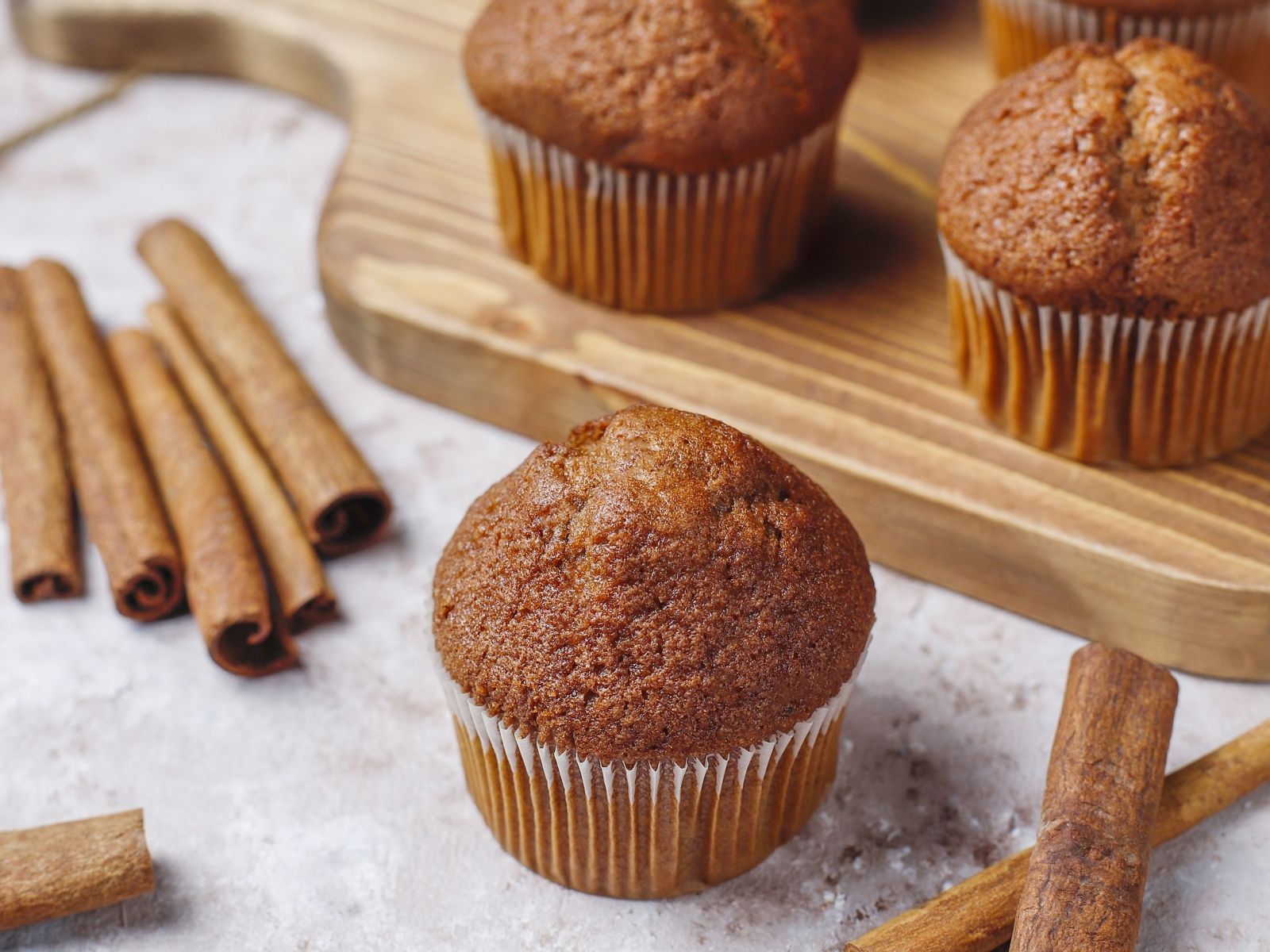 chocolate-muffins-light-brown-background-selective-focus_1600x1200.jpg