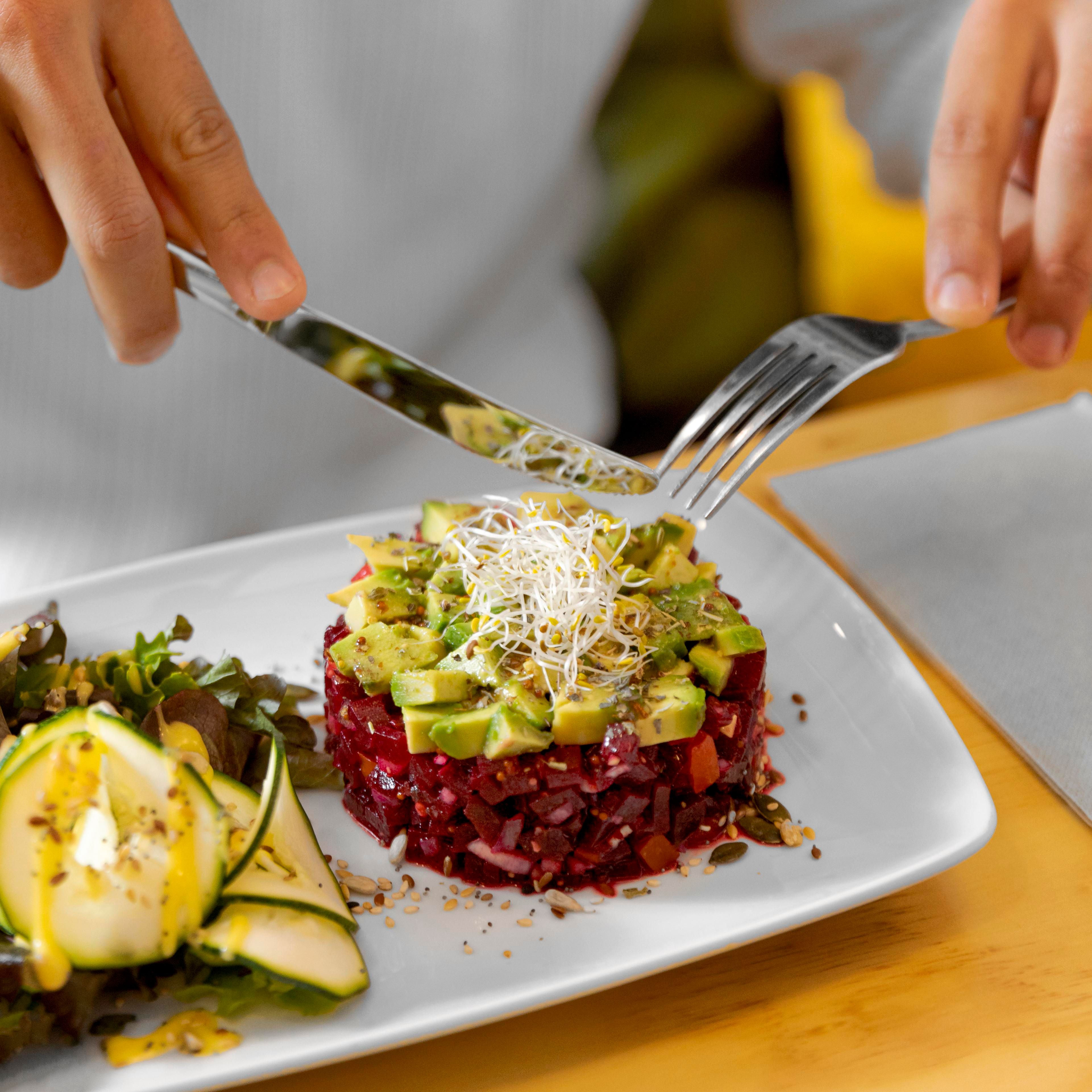 close-up-hands-holding-fork-knife.jpg