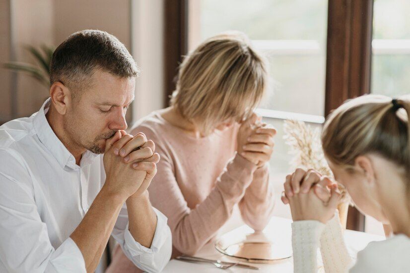 family-praying-together-before-eating-indoors_23-2148769383.jpeg