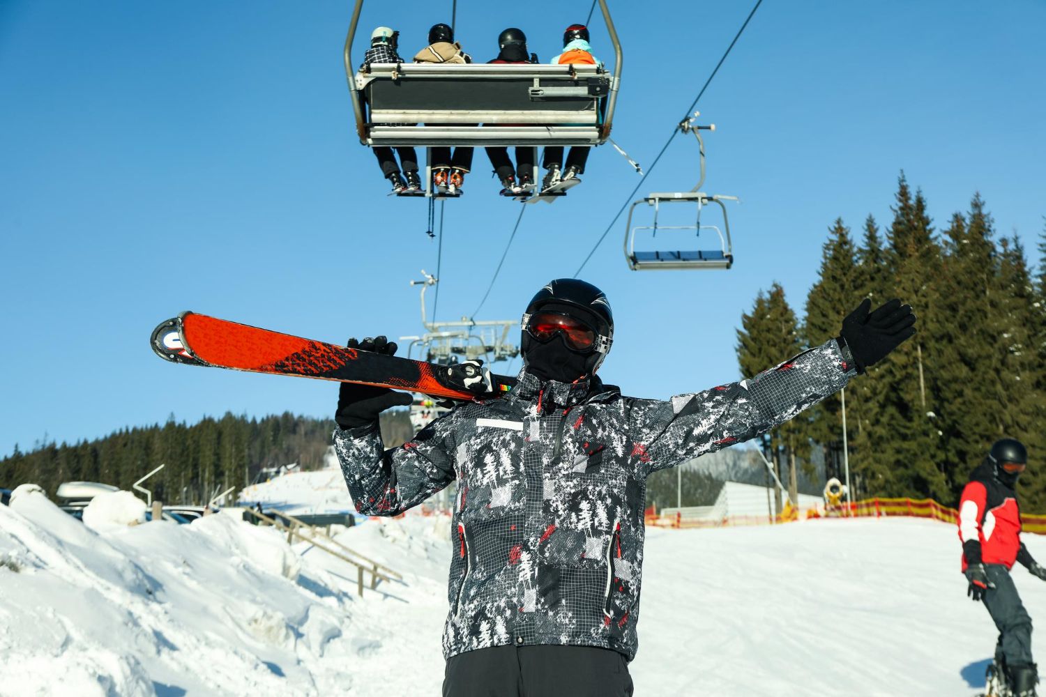 happy-male-skier-mountain-resort-sunny-day.jpg