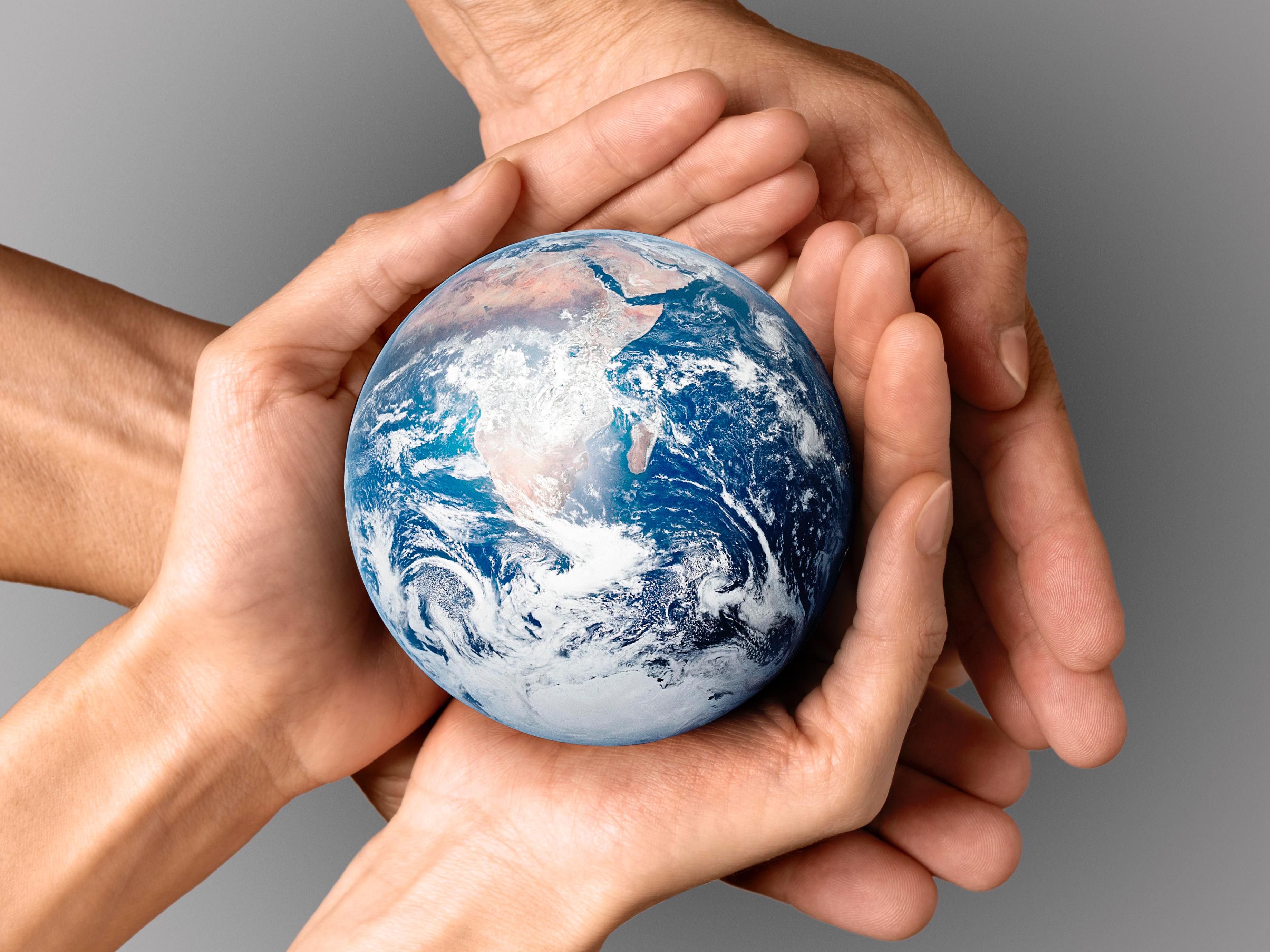 people-holding-earth-their-hands-2.jpg