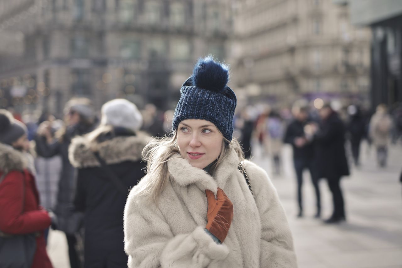 portrait-young-european-female-fur-coat-hat-outdoors.jpg