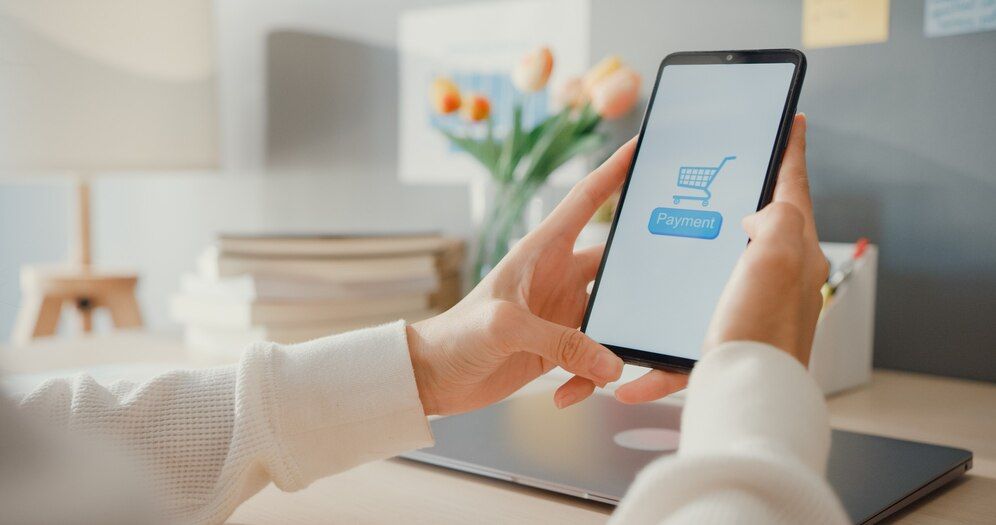 young-lady-use-cellphone-order-online-shopping-product-paying-bills-with-banking-app-with-transaction-successful-stay-house-quarantine-activity-fun-activity-coronavirus-prevention_7861-3270.jpg