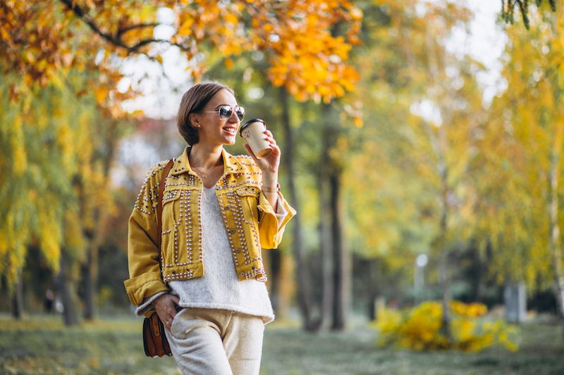 young-woman-autumn-park-drinking-coffee.jpg